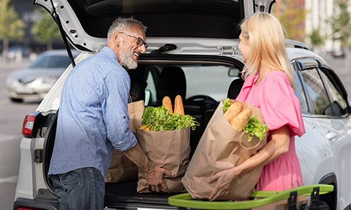 couple with groceries